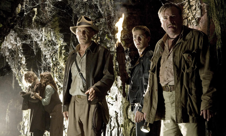 Indiana Jones with others looking concerned in "Indiana Jones and the Kingdom of the Crystal Skull"