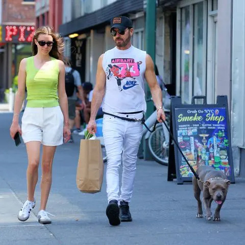 <p>Christopher Peterson / SplashNews</p> Nicole Brydon Bloom and Justin Theroux with his dog Kuma