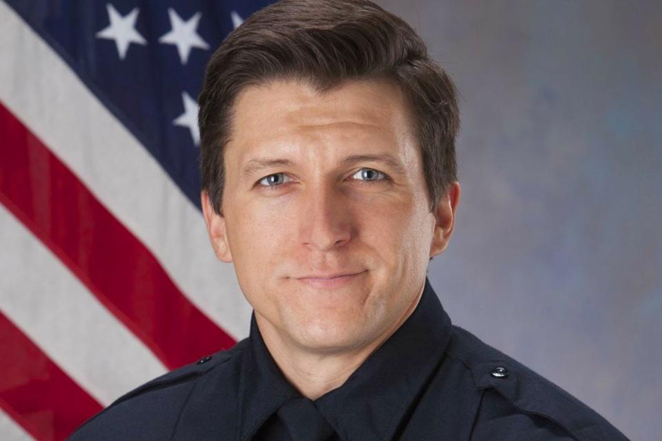 <p>Tucson Police Department </p> Officer Adam Buckner of the Tucson Police Department