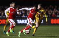 Britain Football Soccer - Sutton United v Arsenal - FA Cup Fifth Round - The Borough Sports Ground - 20/2/17 Arsenal's Jeff Reine-Adelaide in action with Sutton United's Adam May. Reuters / Eddie Keogh Livepic