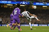 Two-goal Ronaldo keeps Madrid kings of Europe