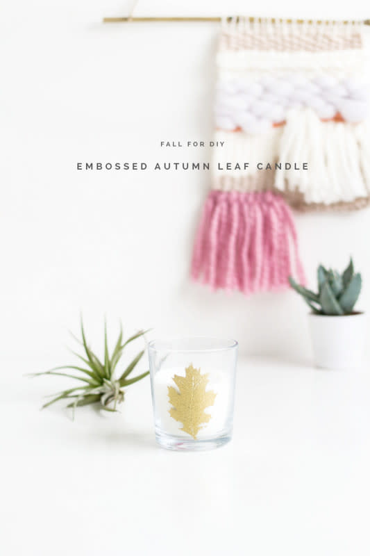 <p>Fall For DIY</p><p>Make one or several of these leaf candles for your Thanksgiving table. You can find steps for this project at <a href="https://fallfordiy.com/blog/2015/10/23/diy-embossed-autumn-leaf-candle/" rel="nofollow noopener" target="_blank" data-ylk="slk:Fall For DIY;elm:context_link;itc:0;sec:content-canvas" class="link rapid-noclick-resp"><em>Fall For DIY</em></a>.</p>