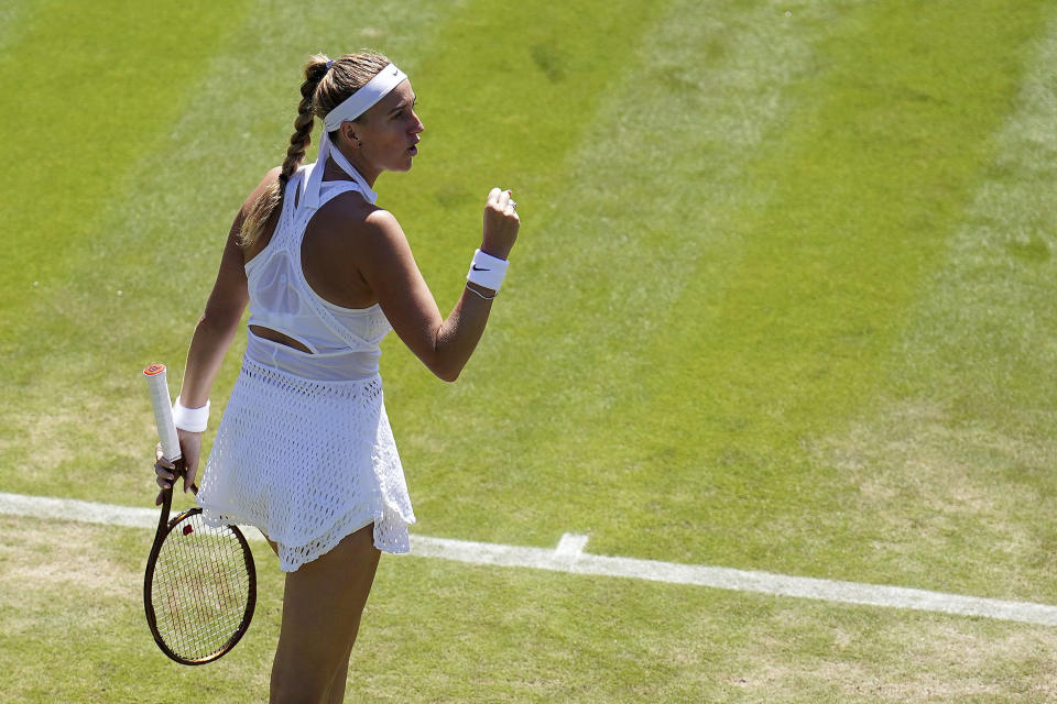 Czech Republic's Petra Kvitova celebrates defeating Aliaksandra Sasnovich of Belarus in the women's singles match on day five of the Wimbledon tennis championships in London, Friday, July 7, 2023. (Zac Goodwin/PA via AP)