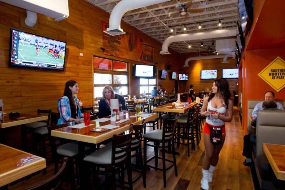 Hooters waitresses have previously gone viral for making hundreds while serving generous clients after one shift. Houston Chronicle via Getty Imag