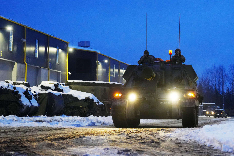 Britain's armoured self-propelled artillery AS-90 move at the Tapa Military Camp, in Estonia, Thursday, Jan. 19, 2023. Senior officials from Britain, Poland, the Baltic nations and other European countries met in Estonia on Thursday before the Ramstein gathering. (AP Photo/Pavel Golovkin)