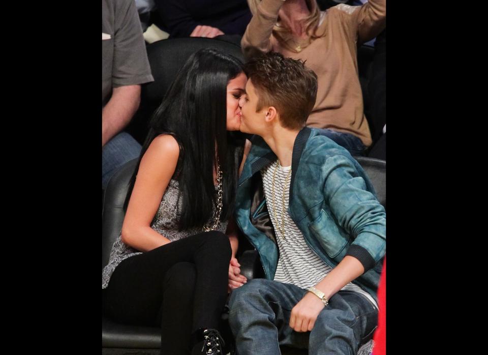 Pucker up! Selena Gomez and Justin Bieber <a href="http://www.huffingtonpost.com/2012/04/18/justin-bieber-selana-gomez-kiss-pda-lakers-game_n_1434321.html?" target="_hplink">shared a kiss on the Kiss Cam at a Lakers Game</a> in LA this week. Ah, young love! (Getty)