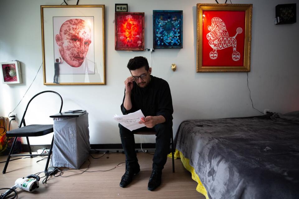 Preston Buffalo, student at Emily Carr University, looks at paperwork from TD Canada Trust inside his Vancouver apartment on Tuesday, September 10, 2019.