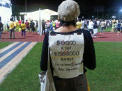 Lynn, a 30-year-old private tutor who stays in Jurong was spotted with a message stuck on her back at the Reform Party rally. She did this because she wanted to send a message to the people to consider voting the opposition. (Yahoo! photo/ Fann Sim)