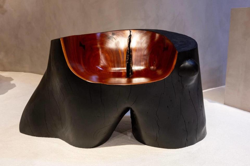 “En Tus Brazos” by Reynald Rodriguez during the VIP opening of Design Miami for Art Basel in Miami Beach, Florida, on Tuesday, December 5, 2023. The artwork is a singular piece of mahogany.