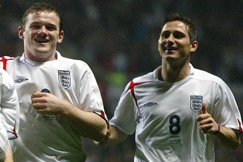 England's Steven Gerrard celebrates scoring for England with Wayne Rooney and Frank Lampard