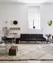 <p> Rooted in the principle of ridding your home of clutter, minimalist living rooms are all over social media at present. And with more of us desiring a &apos;clean&apos; space that features only a few meaningful items, it is easy to understand why. </p> <p> Minimalist living rooms and beige color schemes go hand-in-hand, so it pays to keep your color choices simple. Opt for a white living room with beige and black decor, like the scheme above, and borrow design inspiration from the 1950s, when home decor was kept simple yet beautifully functional. </p>