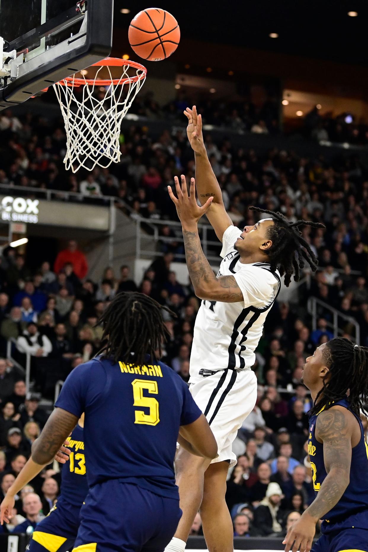 Dec 19, 2023; Providence, Rhode Island, USA; Providence Friars guard Corey Floyd Jr. (14) shoots during the first half against the Marquette Golden Eagles at Amica Mutual Pavilion. Mandatory Credit: Eric Canha-USA TODAY Sports