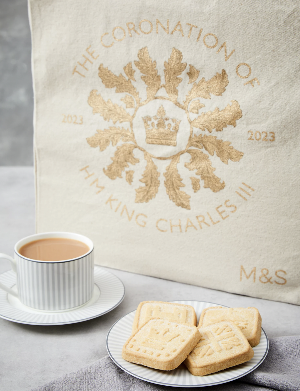 The shortbread and tea may be perishable, but you can treasure the tins for years to come. (Marks & Spencer)