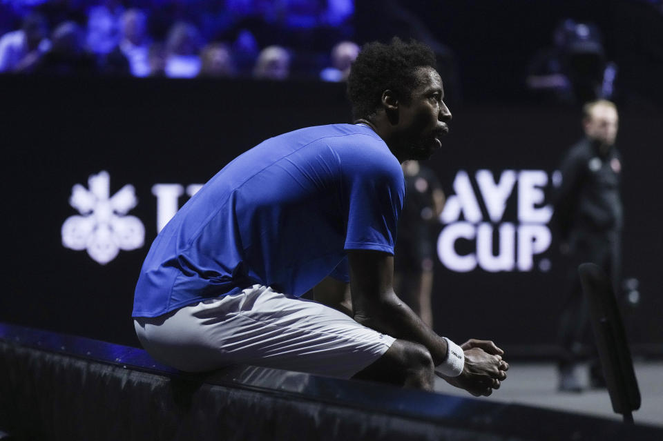 Team Europe's Gael Monfils sits on the advertising boards during a Laver Cup tennis match Friday, Sept. 22, 2023, in Vancouver, British Columbia against Team World's Felix Auger-Aliassime. (Darryl Dyck/The Canadian Press via AP)