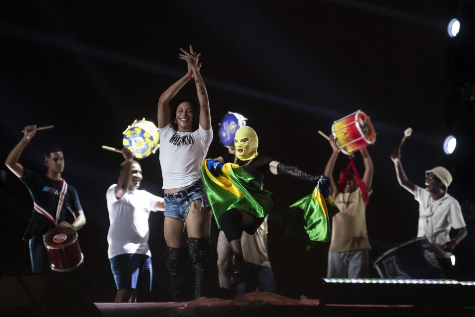 Madonna rehearses in a mask for her Celebration tour in Rio de Janeiro, Brazil, Thursday, May 2, 2024. Madonna, who removed her mask at the end of rehearsal, will conclude her tour on Saturday with a free concert at Copacabana Beach. (AP Photo/Bruna Prado)