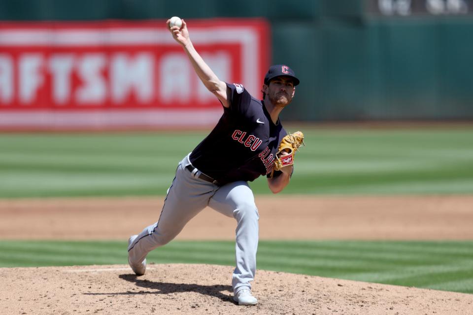 Guardians right-hander Shane Bieber pitches in the third inning of a 3-1 win over the Oakland Athletics on Saturday. [Jed Jacobsohn/Associated Press]