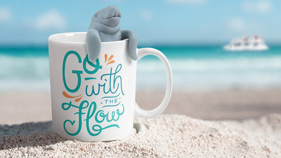 Who wouldn't want an aquatic friend hanging off the side of their mug?