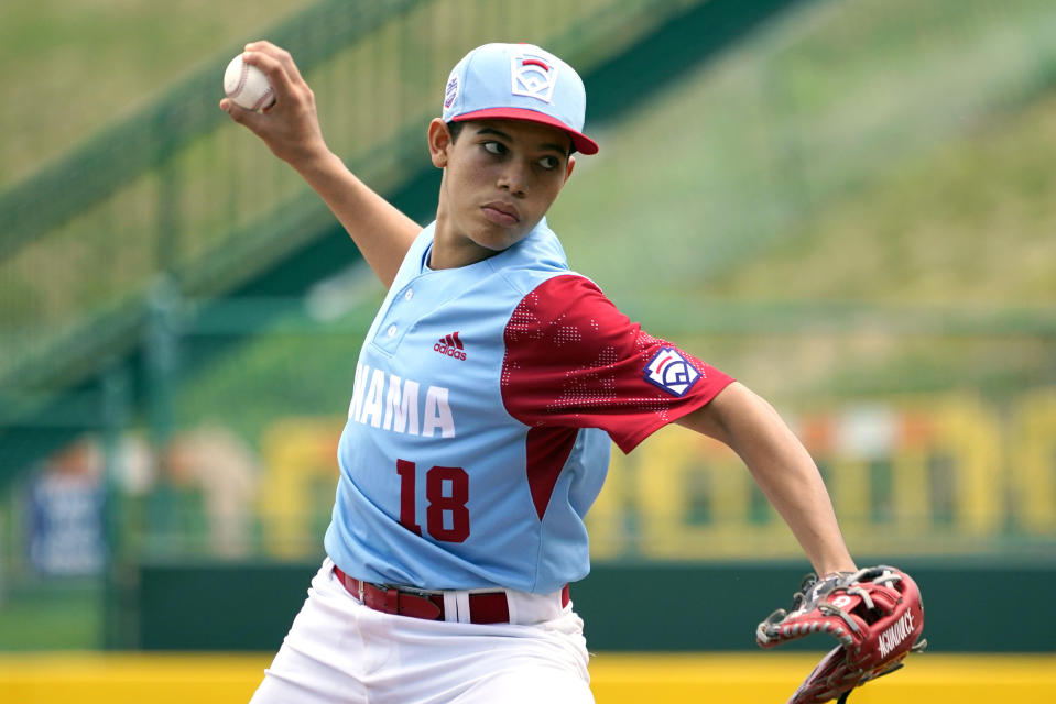 Panama starting pitcher Max Pinzon (18) delivers a pitch against Nicaragua during the first inning of a baseball game at the Little League World Series tournament in South Williamsport, Pa., Tuesday, Aug. 23, 2022. (AP Photo/Tom E. Puskar)