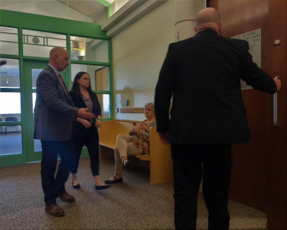 Amber McDaniel, second from left, enters a courtroom in Fort Worth to testify in the murder trial of James Irven Staley III in connection with her son Wilder's death on Monday, March 6, 2023.