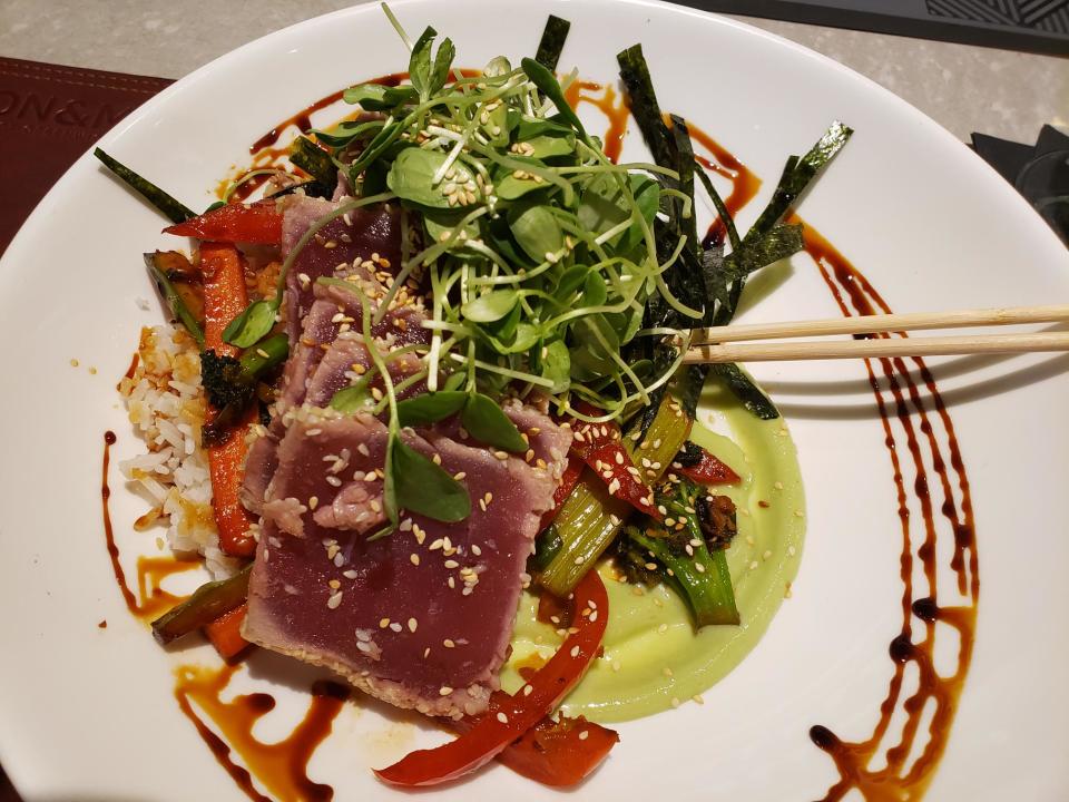 Sesame Tuna with house made kimchi and wasabi can be ordered as an entree with rice or an appetizer.