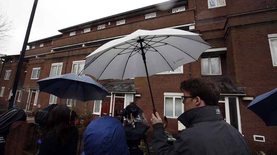 Media outside flats in West London believed to be where Mohammed Emwazi used to live. Emwazi has today been named in reports as Islamic State's 