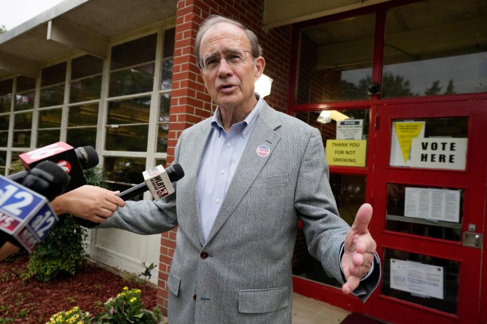 Republican Lt. Gov. Delbert Hosemann speaks to reporters after voting in the party primary at his precinct in Jackson on Tuesday.