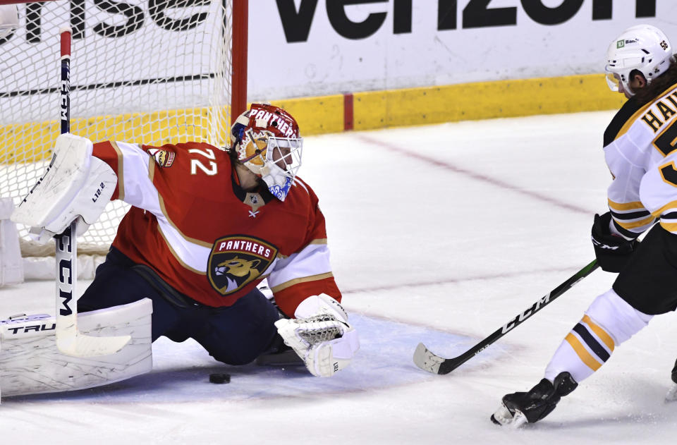Florida Panthers goaltender Sergei Bobrovsky (72) makes a save on Boston Bruins left wing Erik Haula (56) during the second period of an NHL hockey game Wednesday, Oct. 27, 2021, in Sunrise, Fla. (AP Photo/Jim Rassol)