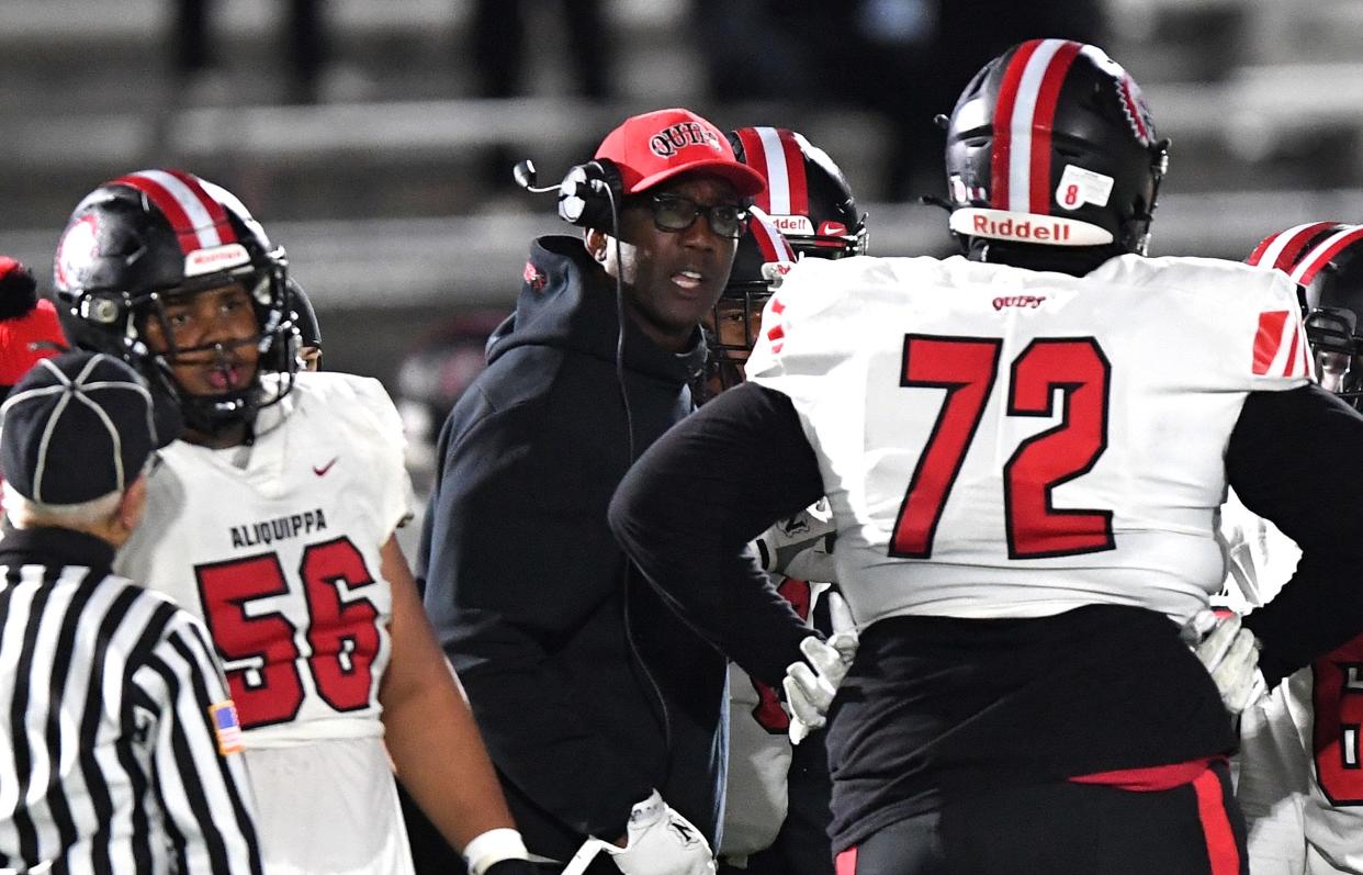 Aliquippa head coach Michael Warfield talks with his team during a late timeout against Jersey Shore during a PIAA Class AAAA state semifinal at Central Cambria High School, Ebensburg, PA., Friday, Dec. 3, 2021.