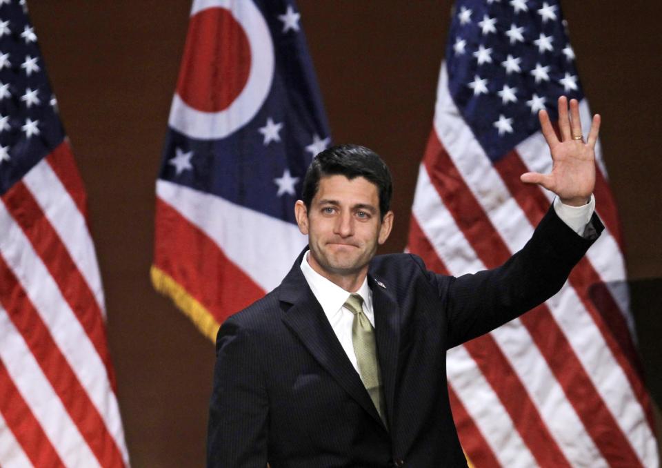 Republican vice presidential candidate Rep. Paul Ryan, R-Wis. waves after speaking to supporters about upward mobility and the economy during a campaign rally at the Walter B. Waetjen Auditorium at Cleveland State University, Wednesday, Oct. 24, 2012, in Cleveland. (AP Photo/Tony Dejak)