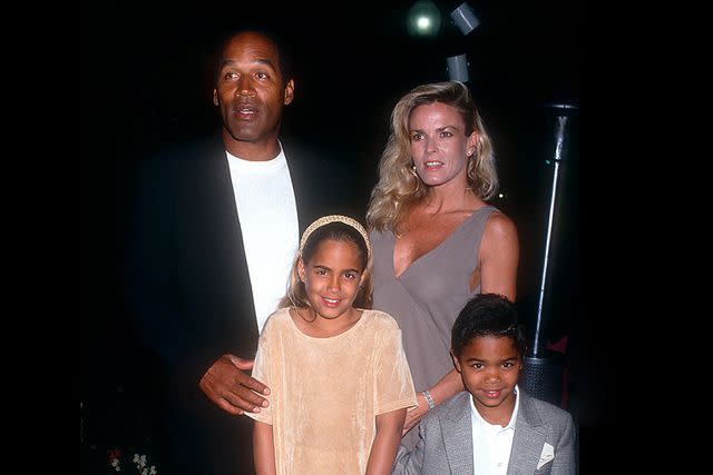 <p>Ron Davis/Getty</p> O.J. Simpson, Nicole Brown Simpson, and their children, Sydney and Justin, three months before her death on June 12, 1994