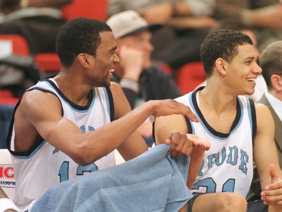 Cuttino Mobley and Tyson Wheeler, from left, on the bench in the final moments of URI's 97-74 victory over Murray State in the first round of the NCAA Midwest Regional on March 13, 1998.