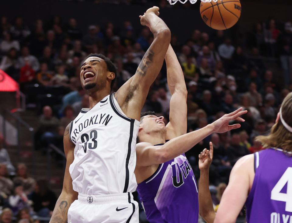 Brooklyn Nets center Nic Claxton (33) and Utah Jazz forward Simone Fontecchio (16) compete to rebound in Salt Lake City on Monday, Dec. 18, 2023. | Jeffrey D. Allred, Deseret News