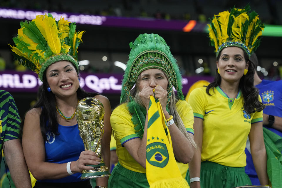 FILE - Brazil soccer fans wait for the World Cup quarterfinal soccer match between Croatia and Brazil, at the Education City Stadium in Al Rayyan, Qatar, Friday, Dec. 9, 2022. (AP Photo/Darko Bandic, File)