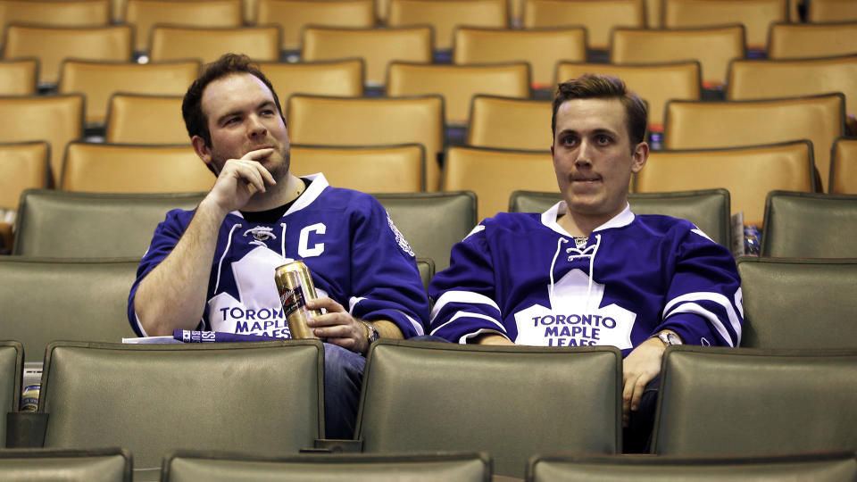 Toronto Maple Leafs fans sit in the stands after the Leafs were defeated in overtime. (REUTERS/Mark Blinch)