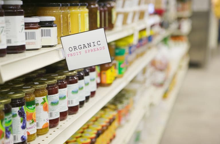 Shelves of organic fruit spreads