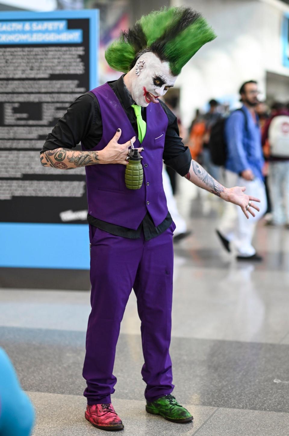 A cosplayer dressed as a punk Joker at New York Comic Con 2022.