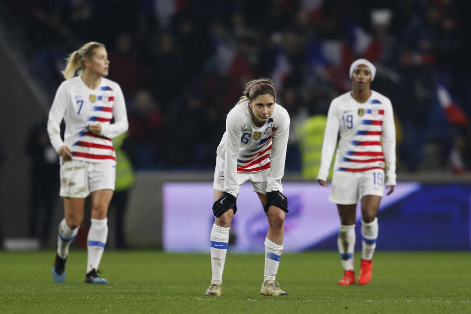 It was a night to forget for Morgan Brian (center), Abby Dahlkemper (left), Crystal Dunn and the U.S. women’s national team against France. (Getty)