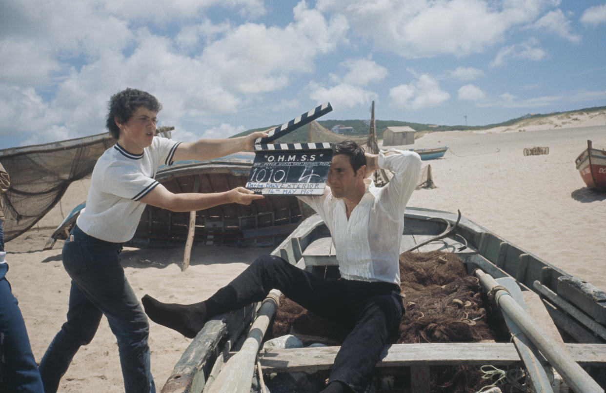 Australian actor George Lazenby films a scene for the James Bond movie 'On Her Majesty's Secret Service' on location on the Praia do Guincho (Guincho Beach), near Cascais in Portugal, 14th May 1969.  (Photo by Larry Ellis Collection/Getty Images)