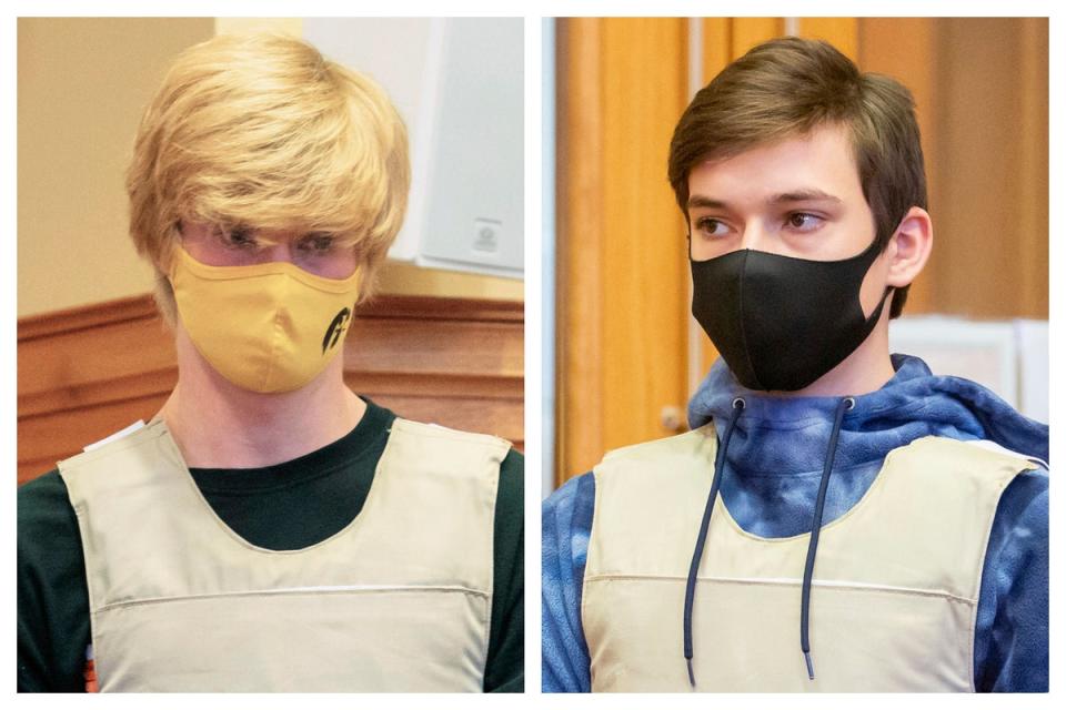 Jeremy Goodale, left, and Willard Miller at the Jefferson County Courthouse in Fairfield, Iowa, on 23 Nov 2021 (AP)