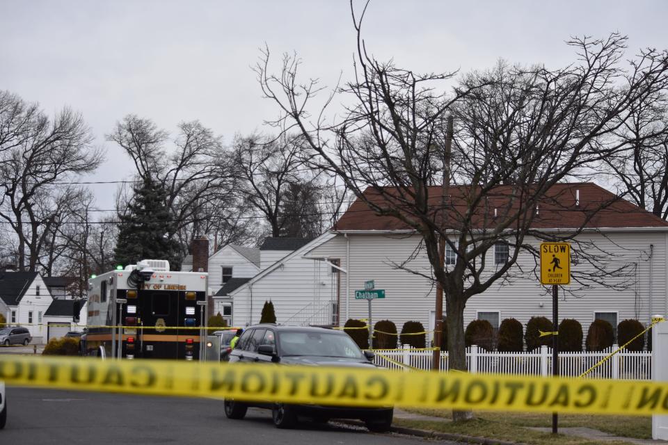 Police investigate a Sunday morning shooting at a home on Chatham Place in Linden that left two adults and two children dead.