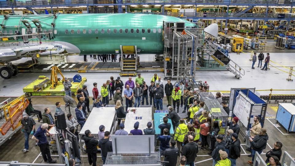 Boeing employees listen to Stan Deal, Boeing Commercial Airplanes President and CEO and other employees in Renton, Wash., on Thursday, Jan. 25, 2024. Alaska Airlines has begun flying Boeing 737 Max 9 jetliners again, Friday, Jan. 26, for the first time since they were grounded after a panel blew out of the side of one of the airline's planes.(Boeing via AP)