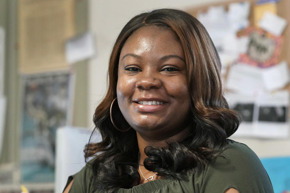 Dana Anthony is seen at her workplace at The Daily Tar Heel newspaper in Chapel Hill, N.C., Tuesday, April 13, 2021. Anthony was rejected after two speparate HireVue interviews for other jobs recently. The pandemic has heightened demand for online services that interview job applicants remotely and use artificial intelligence to assess their skills. But the technology also raises questions about whether computers can accurately judge a person's character traits and emotional cues. (AP Photo/Gerry Broome)