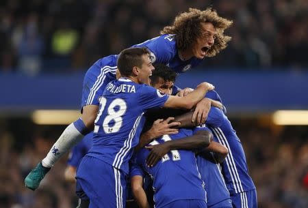 Britain Soccer Football - Chelsea v Manchester United - Premier League - Stamford Bridge - 23/10/16 Chelsea's N'Golo Kante celebrates scoring their fourth goal with David Luiz and team mates Action Images via Reuters / John Sibley Livepic