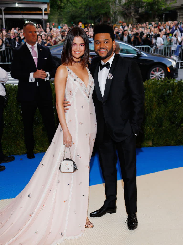 Selena Gomez and The Weeknd made their debut as a couple at the Met gala. (Photo: Jackson Lee/FilmMagic)