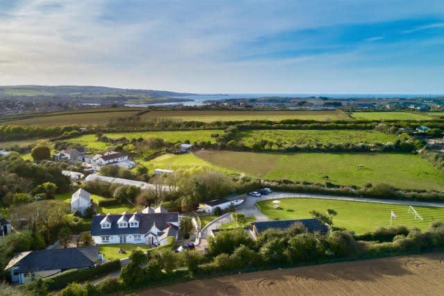 Aerial view of the house and grounds