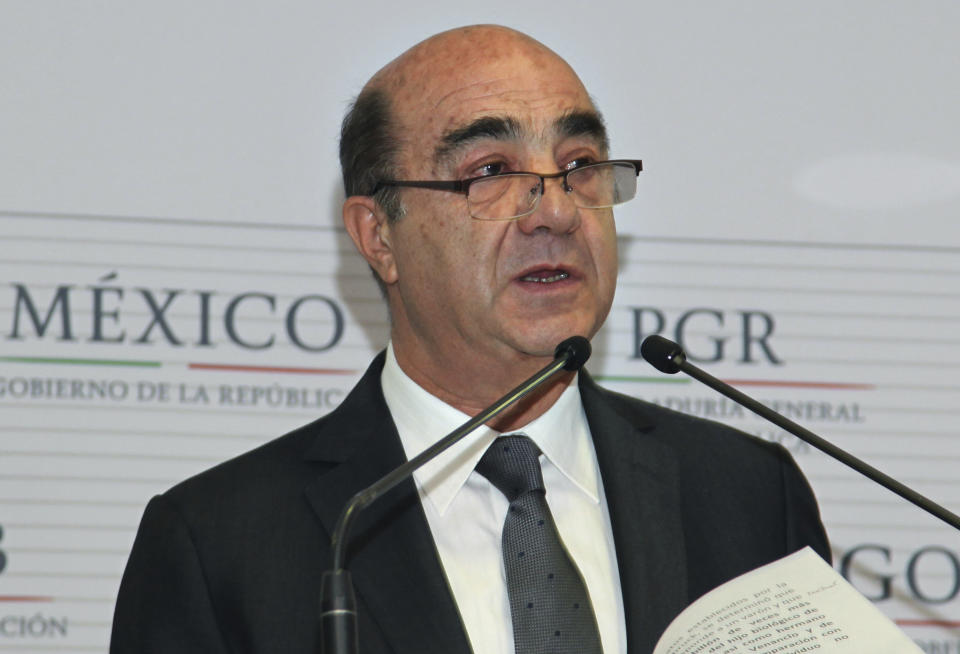 FILE - Mexico's Attorney General Jesus Murillo Karam gives a news conference in Mexico City, Dec. 7, 2014. The Mexican Attorney General's Office reported on Friday, Aug. 19, 2022, it has detained Murillo Karam, who was in charge of the investigation into the disappearance of the 43 student teachers that occurred in southern Mexico in 2014. (AP Photo/Marco Ugarte, File)