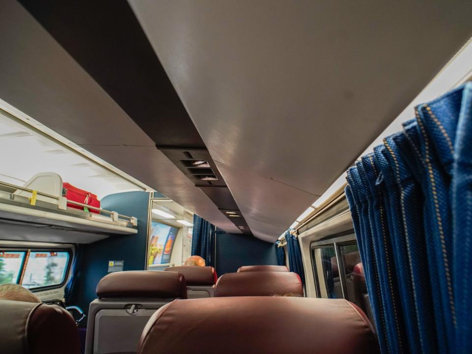 Seats in a business-class Amtrak car