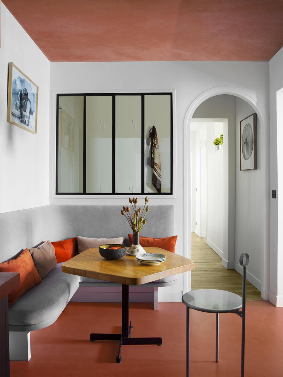 A dining room with a painted ceiling