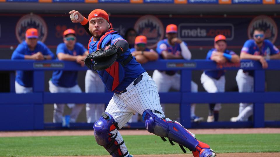 Mar 10, 2024; Port St. Lucie, Florida, USA; New York Mets catcher Francisco Alvarez (4) picks up a bunt and throws out Detroit Tigers centerfielder Parker Meadows in the fourth inning at Clover Park.