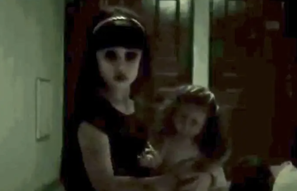 A little girl with demonic eyes